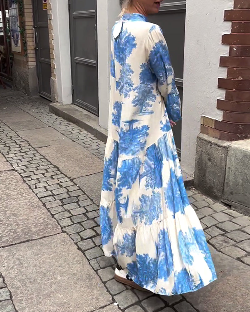Kyllikki | Pitkä mekko, V-aukko, kellohihat ja kukkakuvio